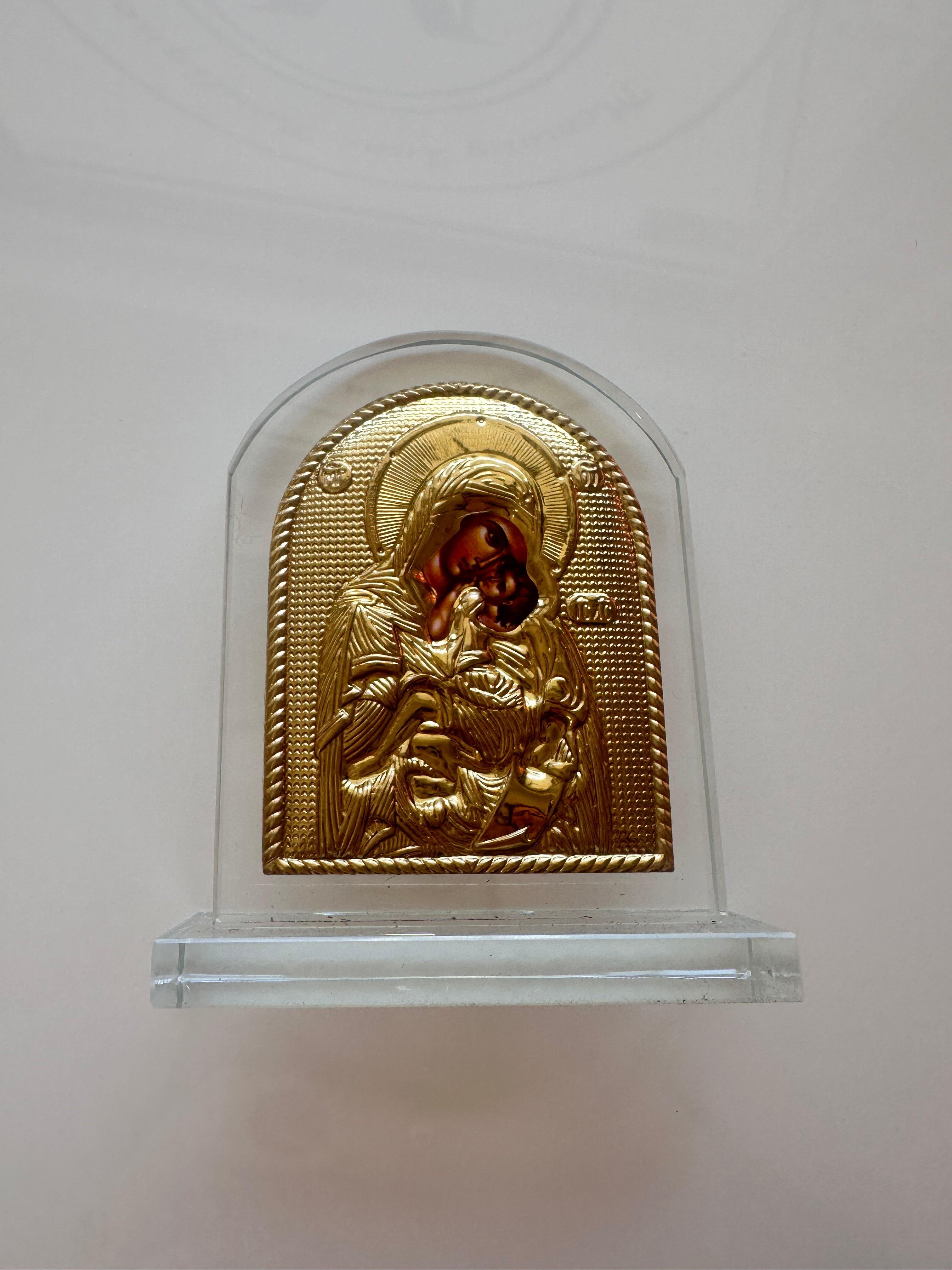 Gold Icon on glass stand