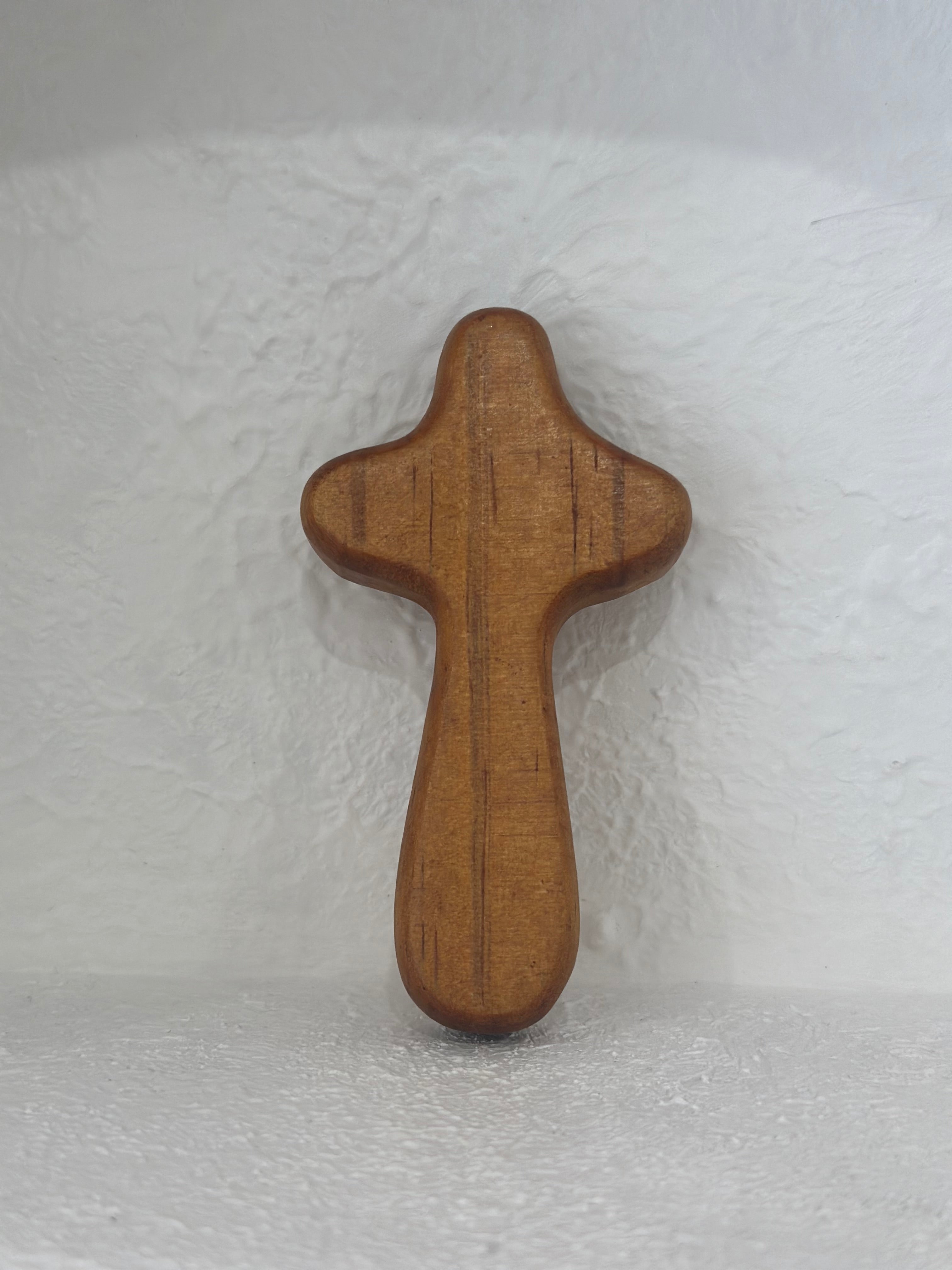 Wooden holding Cross