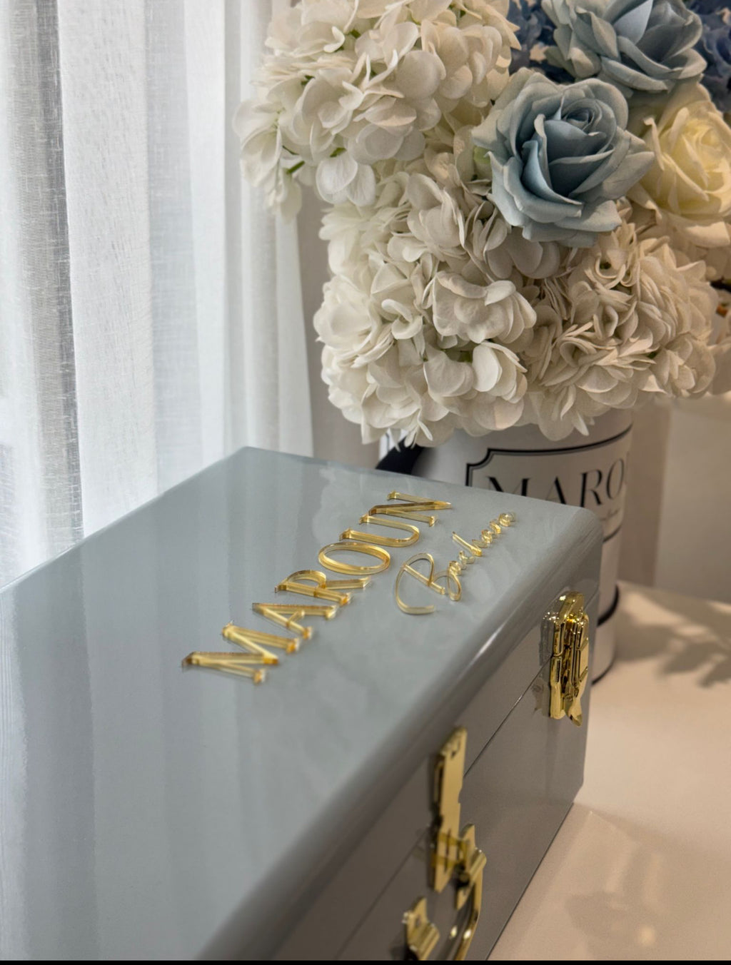 Blue metal trunk with mirror acrylic name